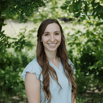 Rylee Sutton smiles at the camera.