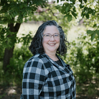 Andi Giedeman smiles at the camera.