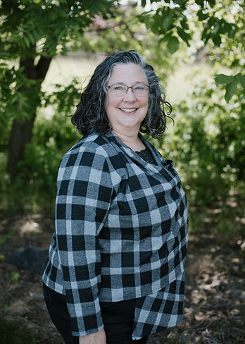 Andi Giedeman smiles at the camera.