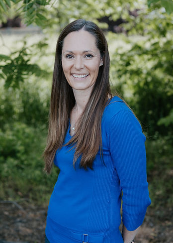 Jodi Kolb smiles at the camera.
