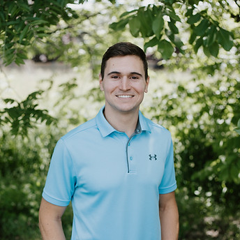 Mitch Lesmeister smiles at the camera.
