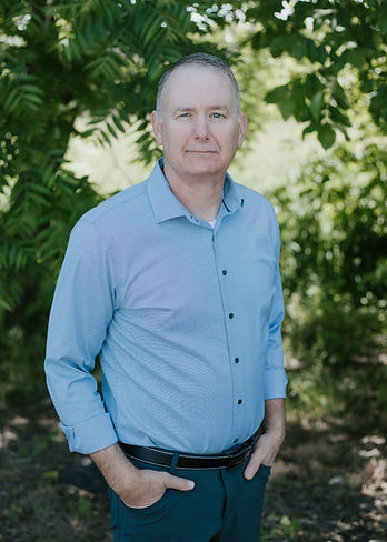 Mike Clark smiles at the camera.